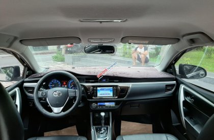 Toyota Corolla altis 1.8G AT 2015 - Bán ô tô Toyota Corolla altis 1.8G AT 2015, màu đen