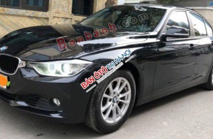 BMW 3 Series 320i 2012 - Cần bán xe BMW 320i sản xuất 2012, model 2013 màu đen