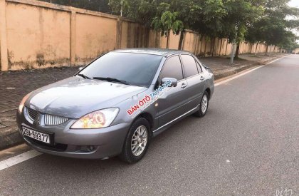 Mitsubishi Lancer   2004 - Chính chủ bán Mitsubishi Lancer sản xuất 2004, màu xám, nhập khẩu