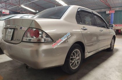 Mitsubishi Lancer   2004 - Bán Mitsubishi Lancer đời 2004, màu vàng, 195tr