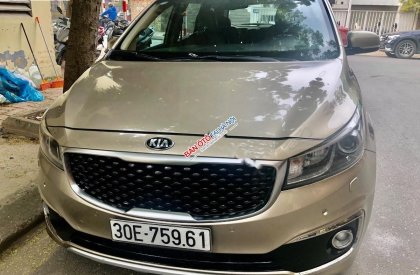 Kia Sedona 2.2L DATH 2017 - Cần bán Kia Sedona 2.2L DATH sản xuất năm 2017, màu vàng, giá tốt