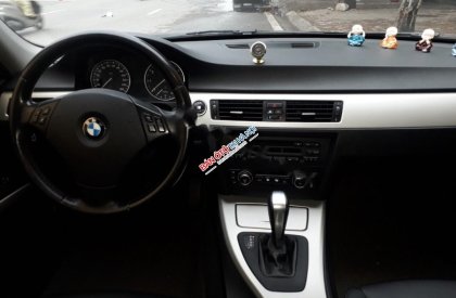 BMW 3 Series   2010 - Cần bán BMW 320i 2010, màu đen, xe nhập, số tự động