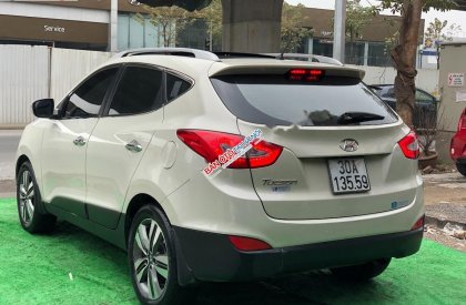 Hyundai Tucson 2.0 AT 2014 - Cần bán lại xe Hyundai Tucson 2.0 AT năm sản xuất 2014, màu kem (be), nhập khẩu số tự động