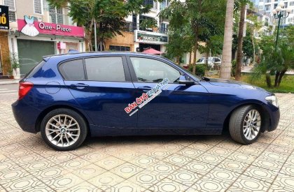 BMW 1 Series 2014 - Bán ô tô BMW 1 Series sản xuất năm 2014, màu xanh lam, xe nhập, giá chỉ 710 triệu
