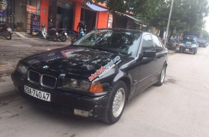 BMW 3 Series 1996 - Bán ô tô BMW 3 Series sản xuất năm 1996, màu đen, nhập khẩu nguyên chiếc xe gia đình