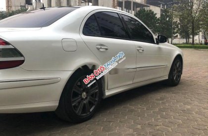 Mercedes-Benz E class E500 AMG 2004 - Cần bán xe Mercedes E500 AMG năm sản xuất 2004, màu trắng, xe nhập, 300tr