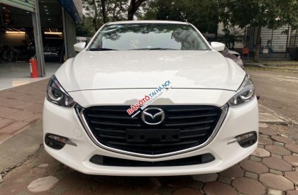 Mazda 3   2018 - Cần bán lại xe Mazda 3 đời 2018, màu trắng, giá 630tr