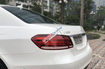 Mercedes-Benz E class E200  2014 - Bán Mercedes E200 năm sản xuất 2014, màu trắng, trả góp 75%