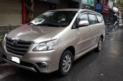 Toyota Innova E 2015 - Xe Toyota Innova E đời 2015, màu vàng, còn mới, giá 408tr