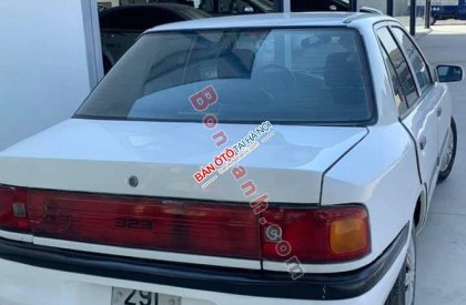 Mazda 323 1997 - Cần bán xe Mazda 323 năm sản xuất 1997, màu trắng, giá 59tr
