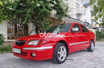 Mazda 323 2000 - Xe Mazda 323 sản xuất năm 2000, màu đỏ, nhập khẩu