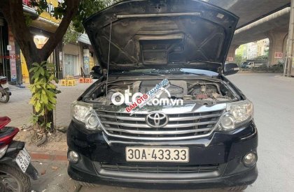 Toyota Fortuner G 2014 - Bán xe Toyota Fortuner 2.5 G 4x2 2014, màu đen số sàn giá cạnh tranh