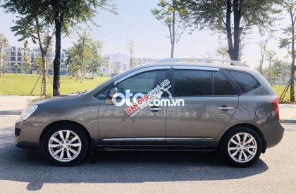 Kia Carens MT 2013 - Cần bán Kia Carens MT đời 2013, màu xám còn mới, 262 triệu