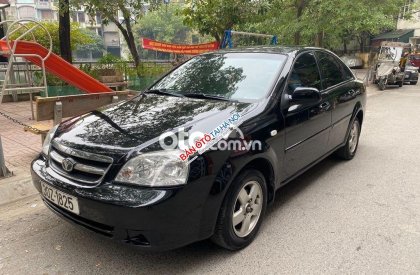 Daewoo Lacetti EX 2010 - Bán Daewoo Lacetti EX sản xuất 2010, màu đen số sàn