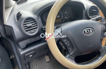 Kia Carens 2009 - Cần bán Kia Carens 2.0 MT đời 2009, màu xám còn mới