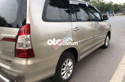 Toyota Innova MT 2014 - Cần bán gấp Toyota Innova MT sản xuất năm 2014, màu bạc  