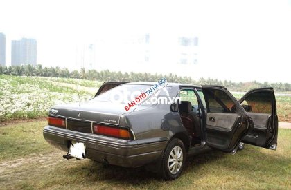 Nissan Cefiro 1992 - Cần bán gấp Nissan Cefiro MT sản xuất 1992, màu xám, xe nhập
