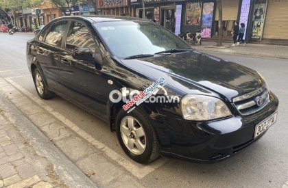 Daewoo Lacetti   EX 2010 - Cần bán Daewoo Lacetti EX sản xuất năm 2010, màu đen số sàn, giá 150tr