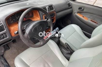 Mazda 323 2.0MT 2000 - Cần bán xe Mazda 323 2.0MT sản xuất 2000, giá 95tr