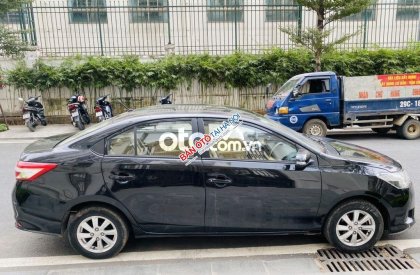 Toyota Vios E 2015 - Bán Toyota Vios E năm sản xuất 2015, màu đen số sàn, giá chỉ 295 triệu