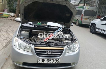 Hyundai Elantra 1.6MT 2009 - Cần bán Hyundai Elantra 1.6MT năm sản xuất 2009, màu bạc