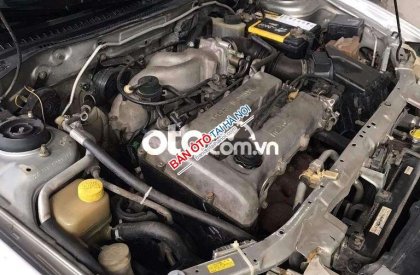 Mazda 323    MT 1997 - Bán Mazda 323 MT năm sản xuất 1997, màu bạc