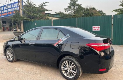 Toyota Corolla 2015 - Cần bán gấp Toyota Corolla 1.8G năm sản xuất 2015, màu đen, giá chỉ 543 triệu