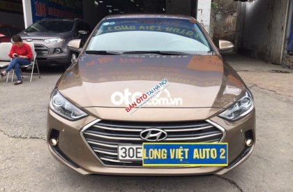 Hyundai Elantra 2016 - Cần bán xe Hyundai Elantra GLS 2.0 AT năm sản xuất 2016, màu vàng cát