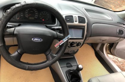 Ford Laser 2002 - Xe màu vàng