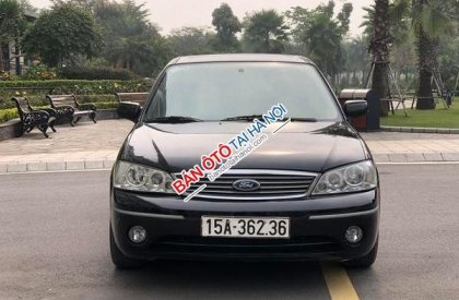 Ford Laser 2004 - Bán ô tô Ford Laser sản xuất năm 2004, màu đen, 179 triệu