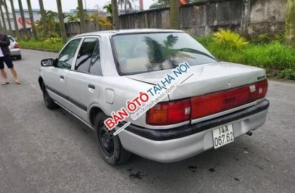 Mazda 323 1995 - Cần bán xe Mazda 323 sản xuất năm 1995, màu bạc, 39 triệu