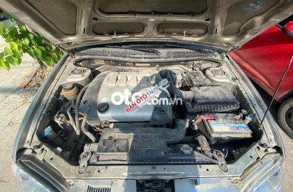 Kia Spectra 2003 - Màu bạc số sàn, giá 95tr