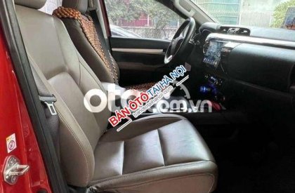 Toyota Hilux   3.0 AT 2015 Cam Đỏ đã lăn bánh 80.800 2015 - Toyota Hilux 3.0 AT 2015 Cam Đỏ đã lăn bánh 80.800