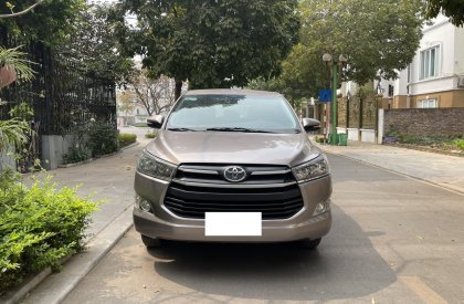 Toyota Innova 2.0E 2018 - Tôi cần bán chiếc xe ô tô Toyota Innova 2.0E màu đồng ánh kim,sx 2018