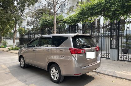 Toyota Innova 2.0E 2018 - Tôi cần bán chiếc xe ô tô Toyota Innova 2.0E màu đồng ánh kim,sx 2018