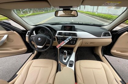 BMW 320i 2015 - Xe màu đen số tự động, 860tr