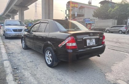 Mazda 323 2003 - Màu đen, giá 90tr