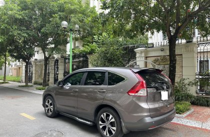 Honda CR V 2.4AT 2014 - Gia đình tôi cần bán chiếc xe ô tô HonDa CRV 2.4AT SX 2014mua sử dụng và lăn bánh 2015