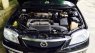 Mazda 323 2003 - Cần bán lại xe Mazda 323 đời 2003, màu đen chính chủ
