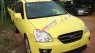 Kia Carens EX 2011 - Cần bán lại xe Kia Carens EX 2011, màu vàng