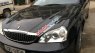 Daewoo Magnus 2003 - Cần bán gấp Daewoo Magnus sản xuất 2003, màu đen, xe nhập số sàn