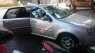 Chevrolet Lacetti EX 2011 - Chính chủ bán Chevrolet Lacetti EX năm 2011, màu bạc