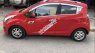 Chevrolet Spark  AT 2014 - Tôi cần bán Spark AT màu đỏ độ full đồ