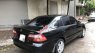 Mazda 626 2004 - Bán xe Mazda 626 đời 2004, màu đen, còn rất chất