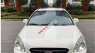 Kia Carens   2.0 AT  2010 - Cần bán Kia Carens 2.0 AT đời 2010, màu trắng chính chủ 