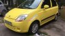 Chevrolet Spark   2010 - Đổi xe mới bán Chevrolet Spark 2010, màu vàng