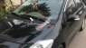Toyota Vios  E 2011 - Bán ô tô Toyota Vios E sản xuất năm 2011, màu đen xe gia đình, giá tốt
