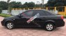 Daewoo Lacetti EX  2011 - Cần bán lại xe Daewoo Lacetti EX 2011, màu đen số sàn, 210tr