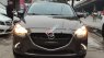 Mazda 2 2016 - Cần bán gấp Mazda 2 sản xuất năm 2016, màu nâu