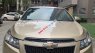 Chevrolet Cruze 2011 - Cần bán gấp Chevrolet Cruze MT đời 2012, màu vàng, nhập khẩu xe gia đình